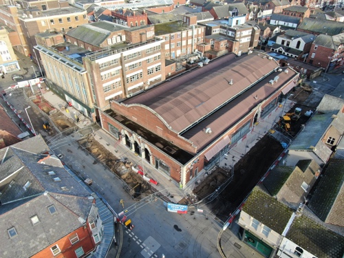 An aerial view of Southport Market, there is some visible fencing in the street - February 2025