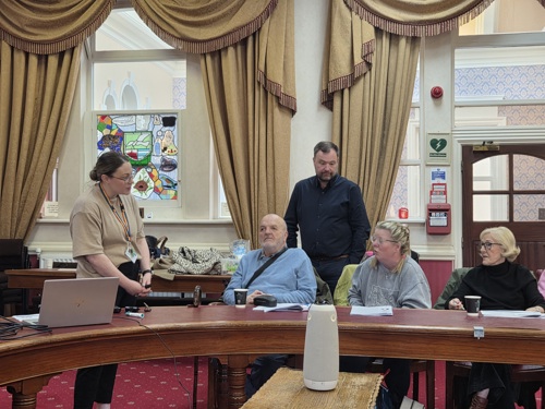 Craig Wilson and Laura Meehan Speaking to members of the Coproduction group