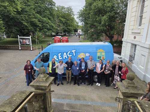 Members of the group visiting the REACT van that comes to peoples homes with small pieces of equipment